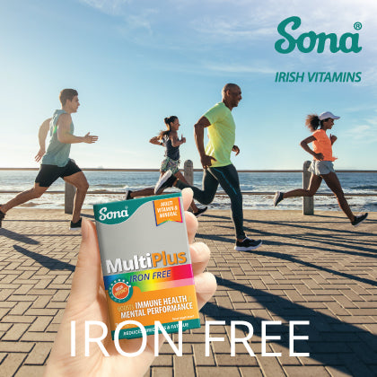 Image of Sona MultiPlus Iron Free supplement held by a person, with runners in the background by the beach. The Sona logo and 'Irish Vitamins' are displayed at the top
