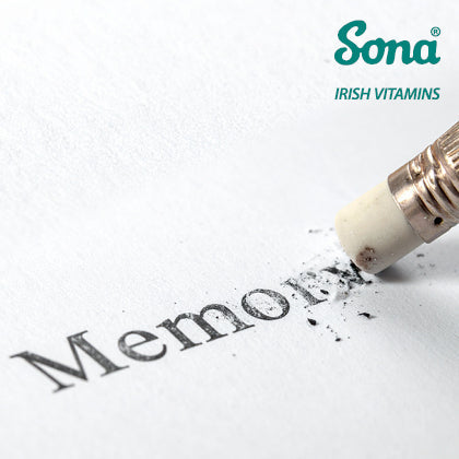 Pencil erasing the word memory on paper, symbolising memory loss.