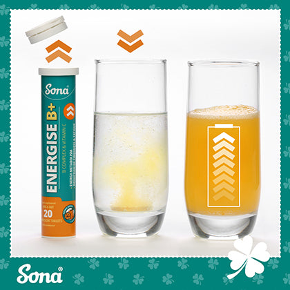 Image of Sona Energise B+ effervescent tablets dissolving in water and resulting in an orange drink. The packaging and glass show energy-boosting effects with upward arrows, emphasizing vitamin B complex benefits. Sona logo at the bottom